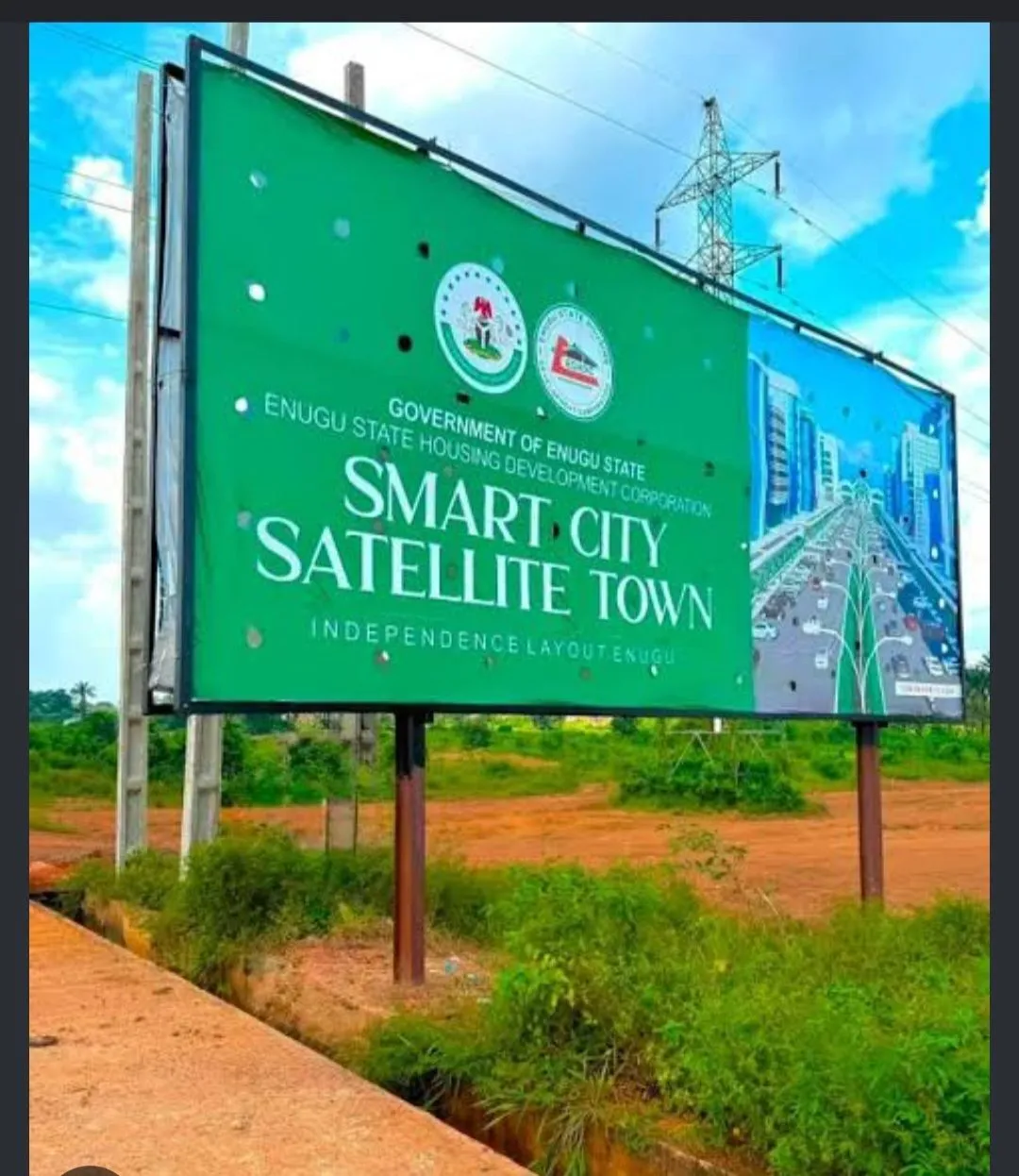 Satellite Town estate signage beside open land at Satellite Estate, Nike, Enugu