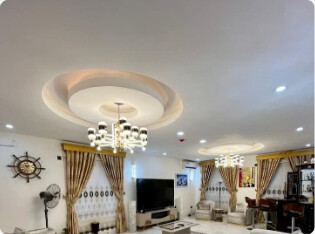 Styled living room with chandelier and seating